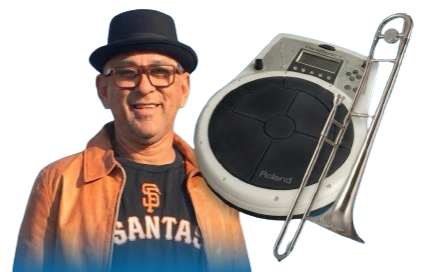 Edmundo Pina Machín «Mundele», con sombrero, junto a su percusión electrónica Roland HandSonic y su trombón